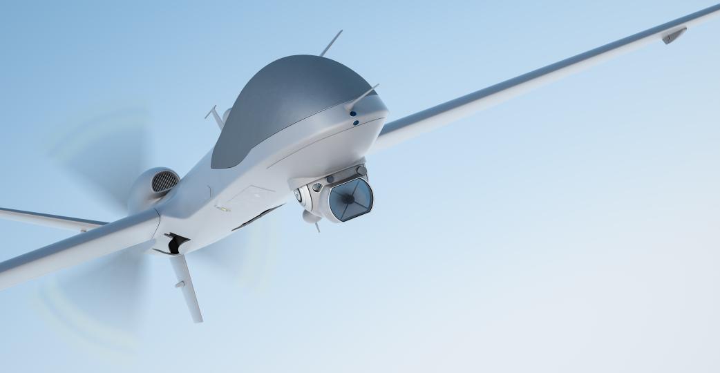 Image of a drone against blue sky