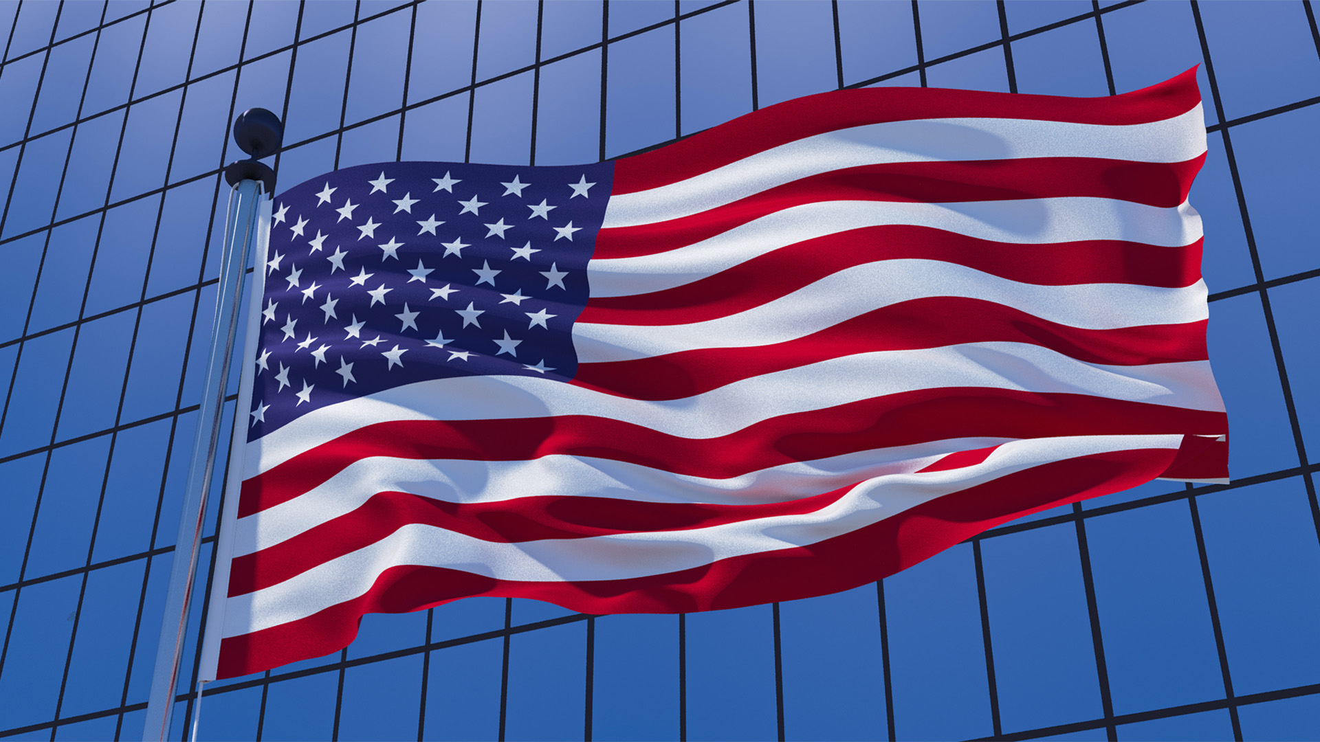 United States of America flag on skyscraper building background.