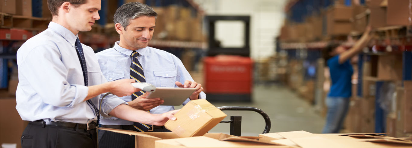 Men scanning a package for tracking