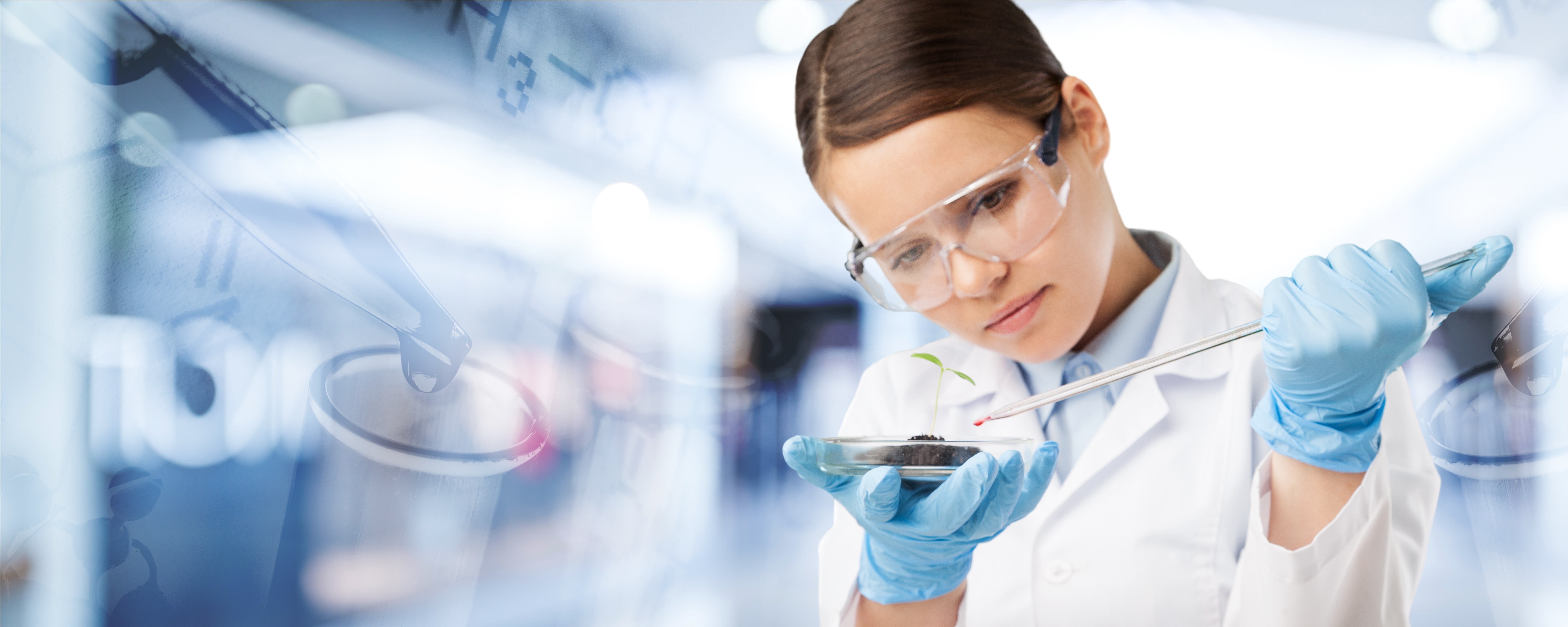 Image of woman in a lab doing testing