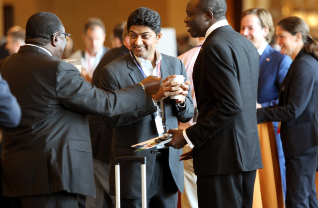 Participants at Discover Global Markets business development forum network