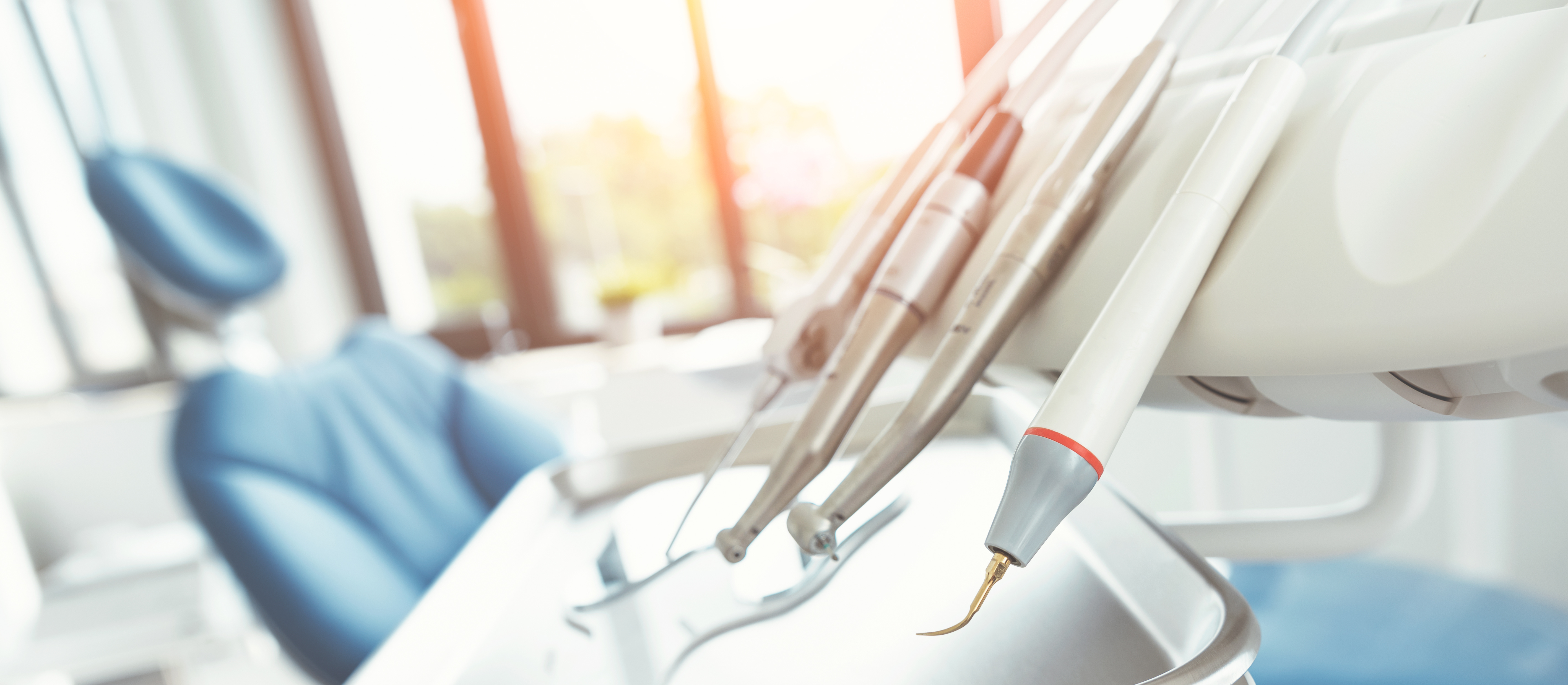 dental chair with dentist implements