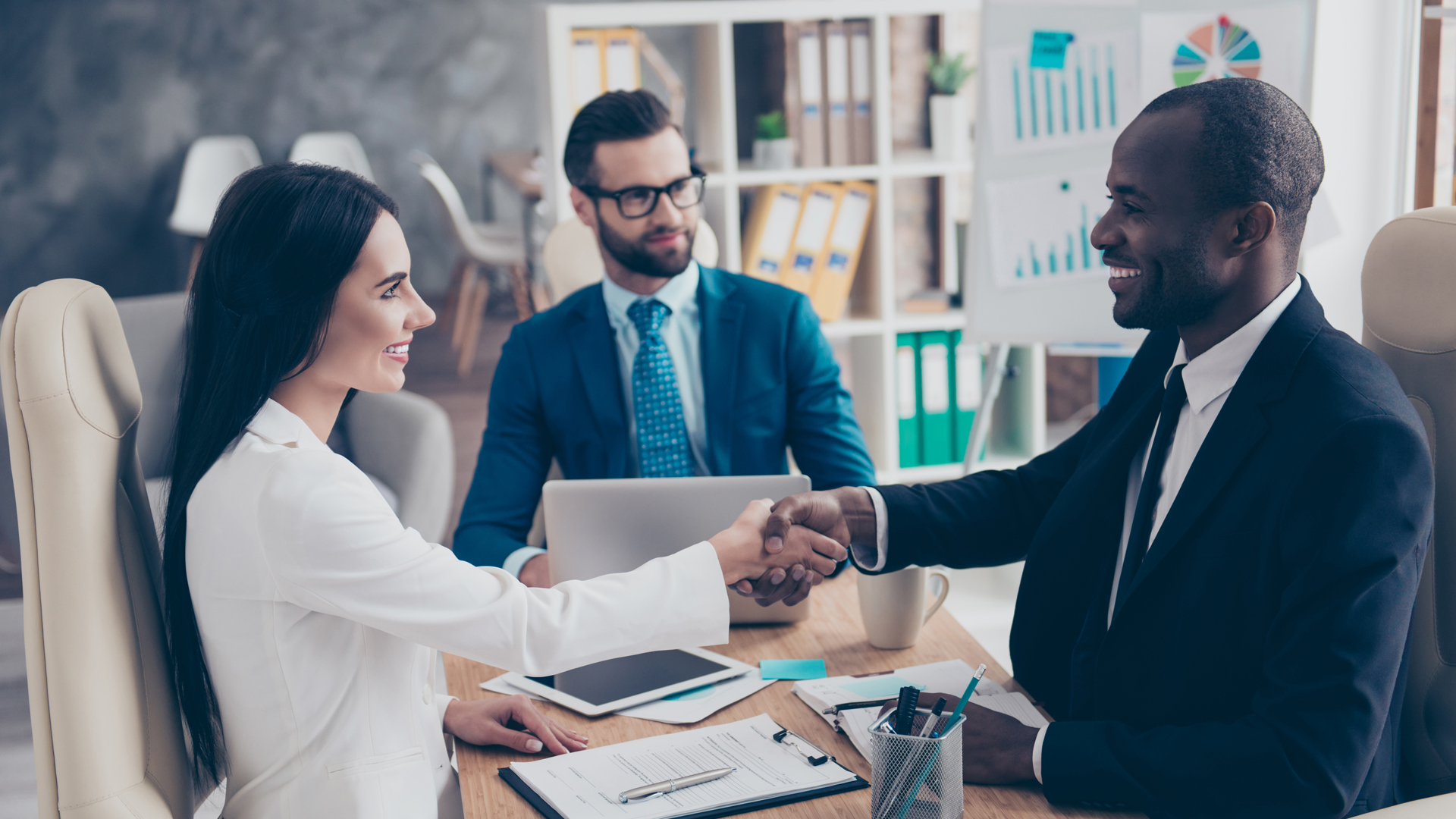 Partners making deal, shaking their hands Image