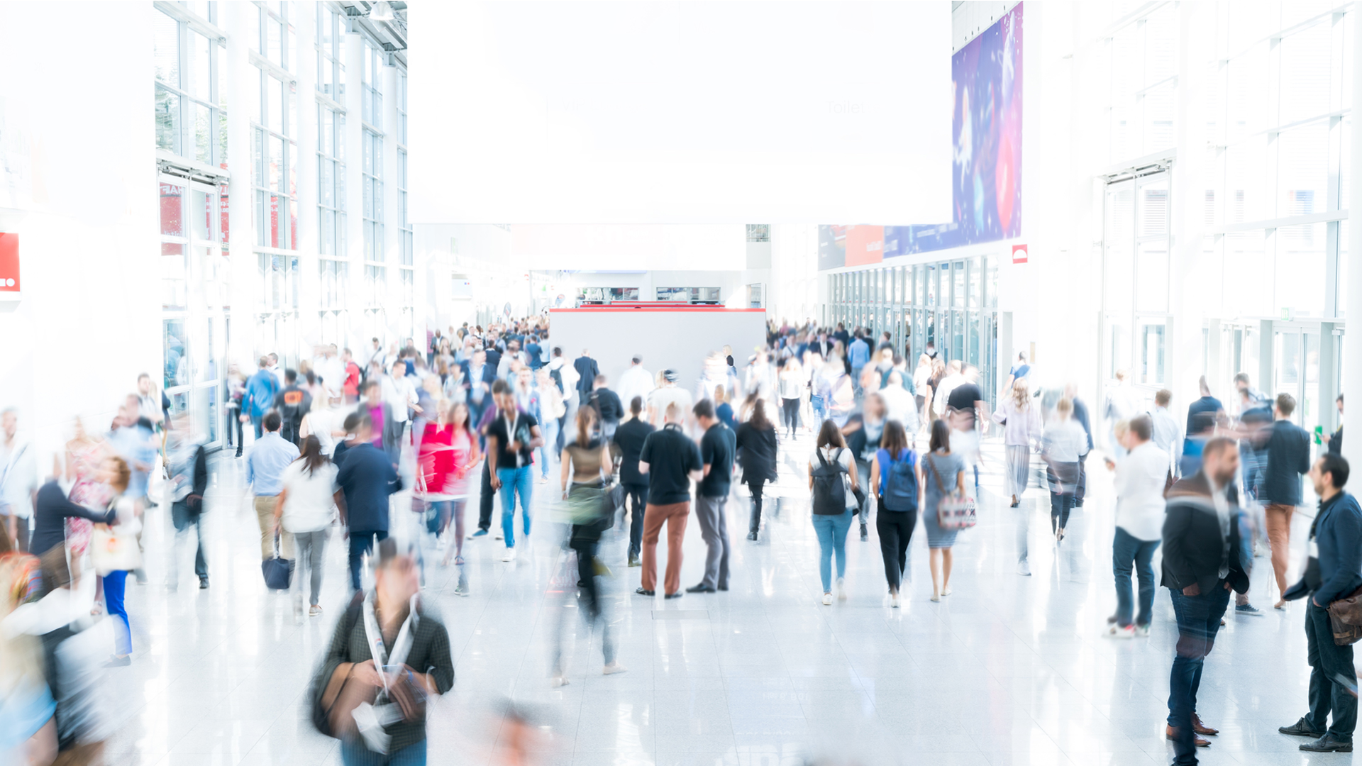 Blurred people at a trade fair with white background image for Hero Box