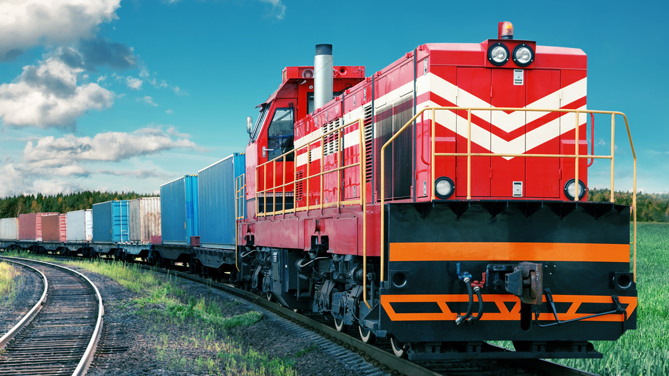 Image of a red train with shipping containers