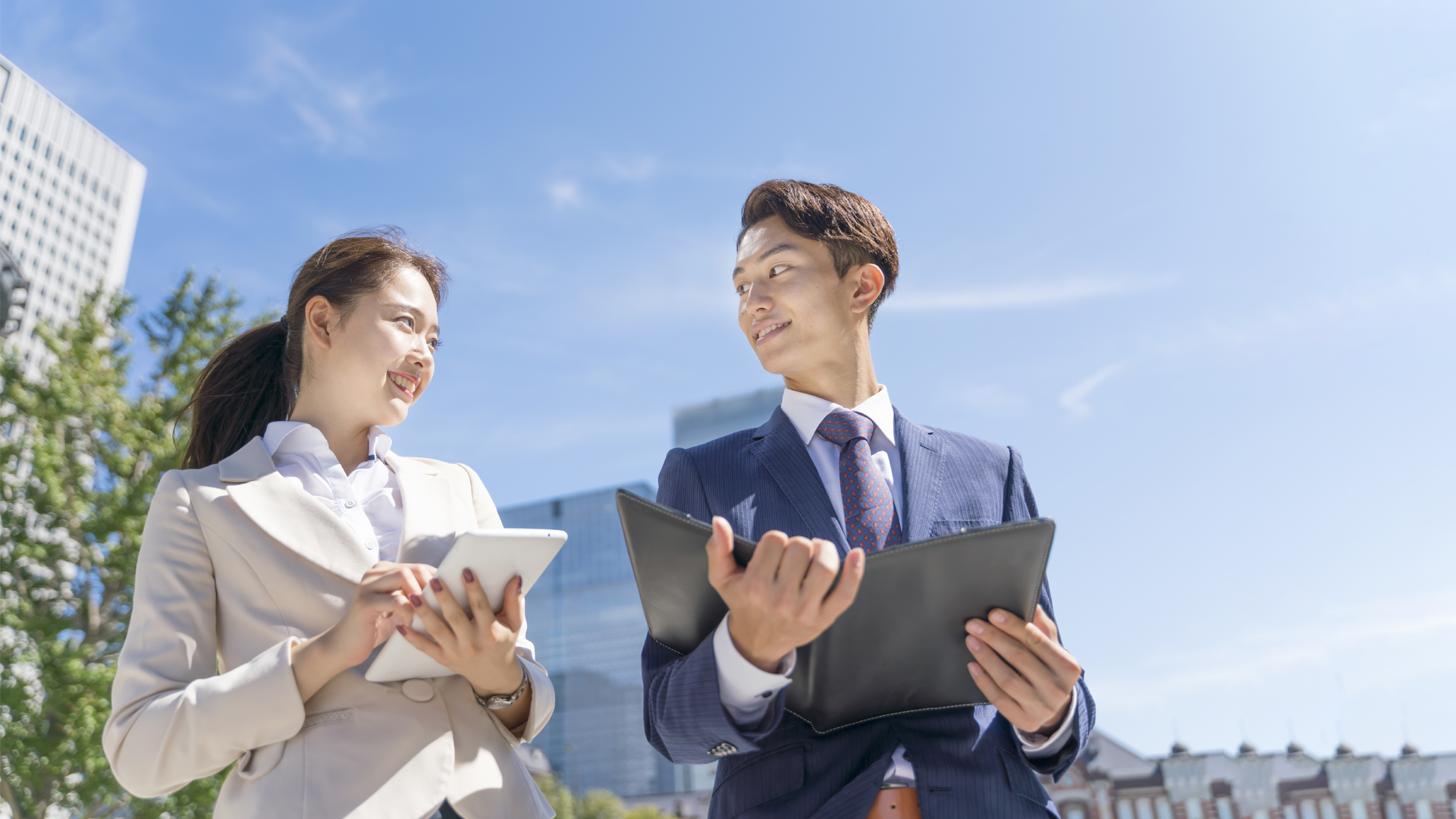 Asian Business Men and Women Meeting Blue Sky Background