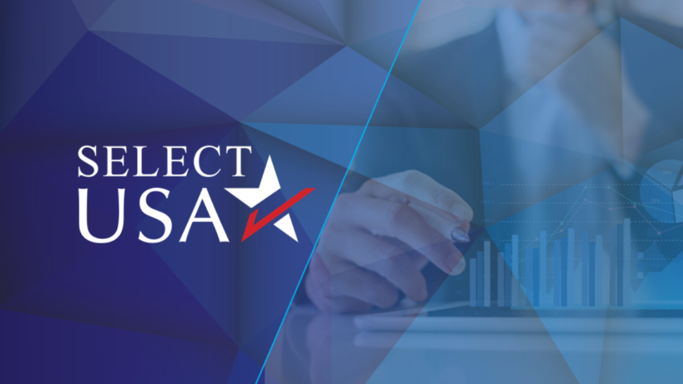 SelectUSA logo with image of man writing on a board, graphs.