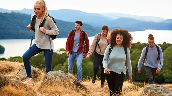 group of young people hiking 