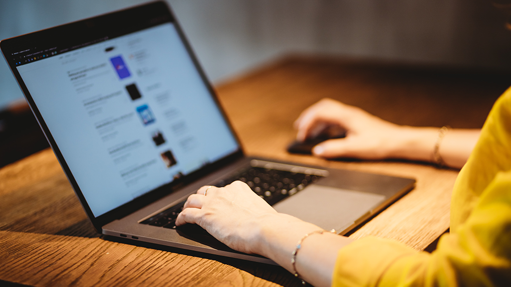 lady sitting working at laptop