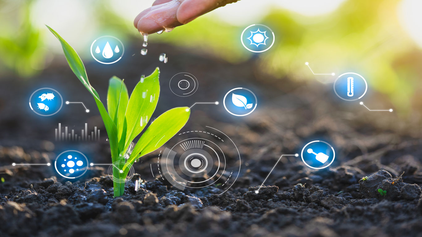 hand watering plant in the dirt with water technologies icons overlayed