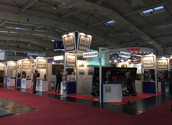 Conference show floor with several booths