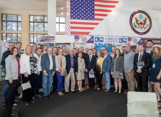 Large group of people posing for a picture in a U.S. embassy in Ukraine