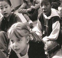 A group of children learning to read