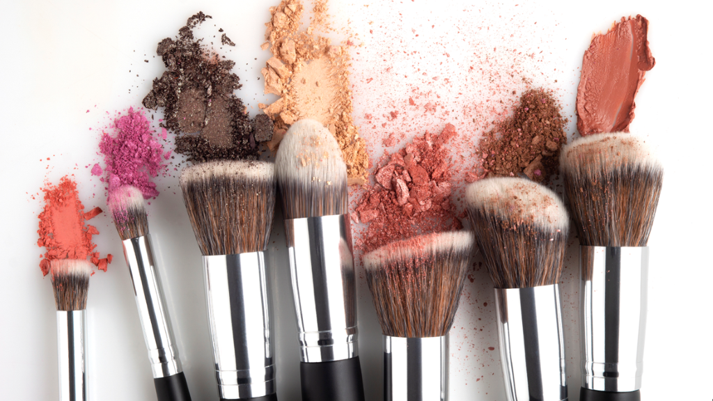 Make up brushes with blush and eyeshadow pigments