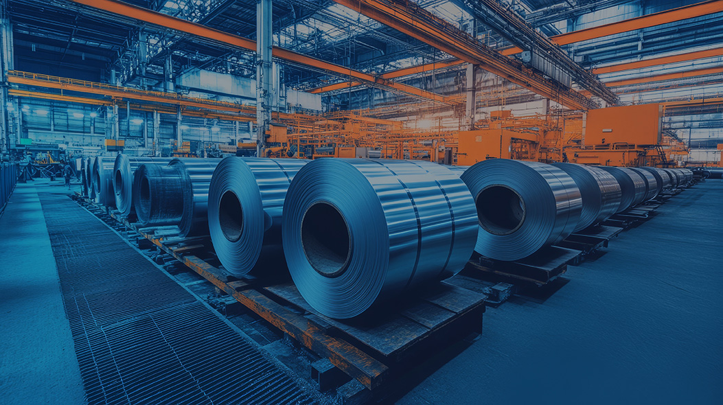 In a warehouse, steel coil is stacked and prepared for use in industry and for distribution.