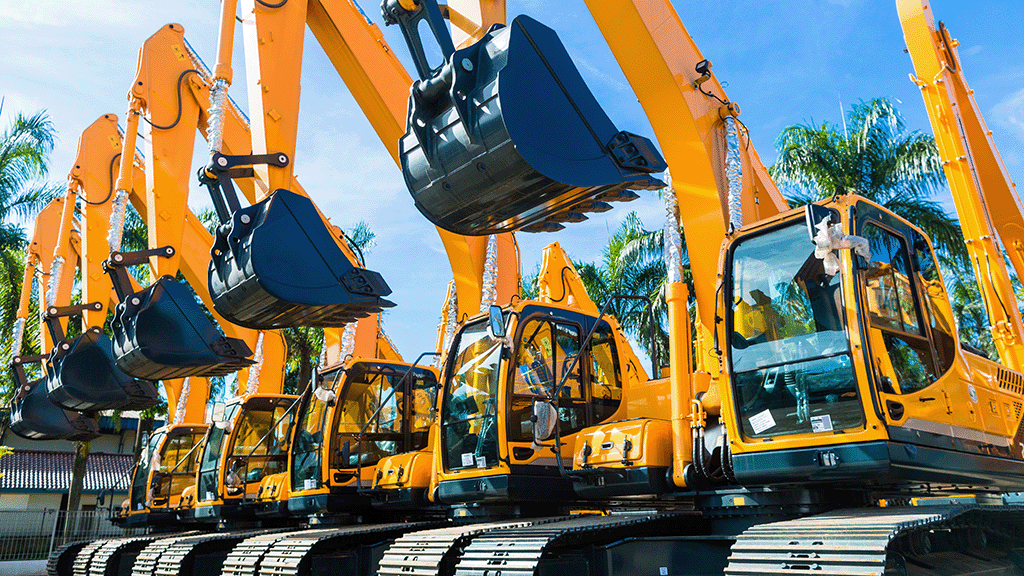New construction equipment lined up in a row