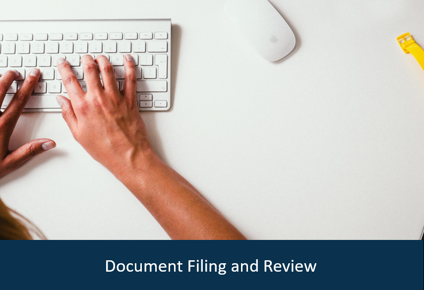 a hand on a keyboard with a blue ribbon underneath with text that says "document filing & review"
