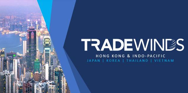 TradeWinds logo over cityscape