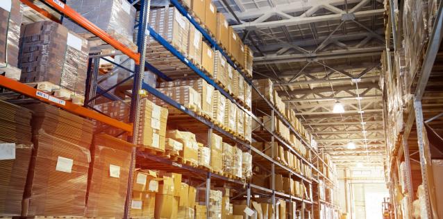 Warehouse filled with shelves of boxed goods