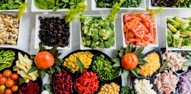 Various colorful food in small portions