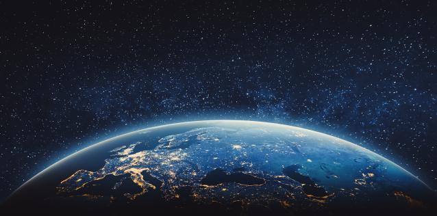 view of blue earth from black space
