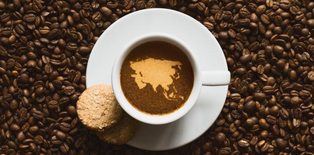 Coffee with map of Asia continent in the cup image for hero box