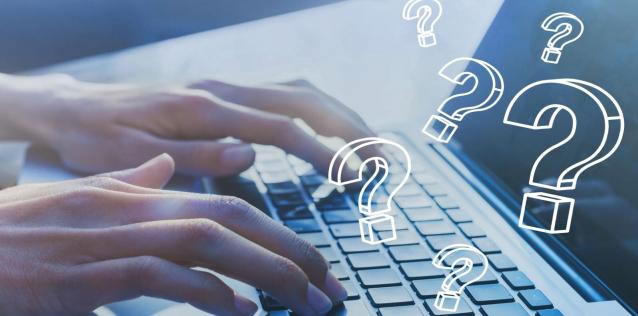 Two hands at a keyboard with question marks overlaid