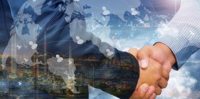 Men shaking hands with global map overlay and people icons networking the map