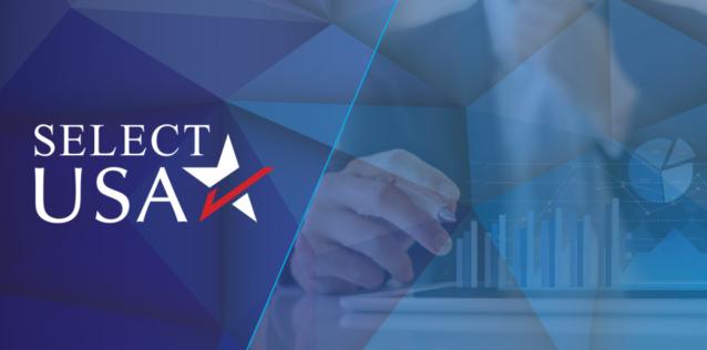 SelectUSA logo with an image of a man writing on a smartboard.