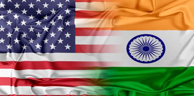 The United States of America flag merged with the India flag graphic 