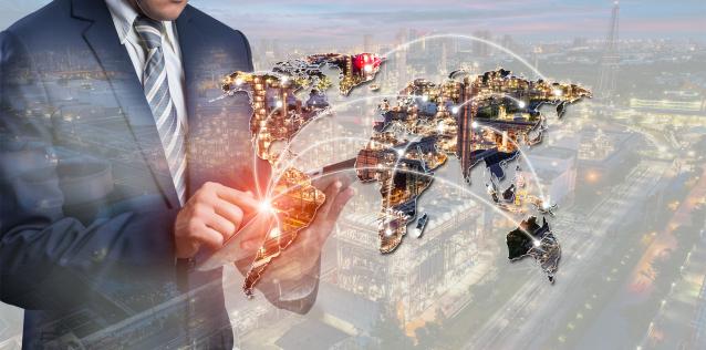 businessmen using smart phone with Oil and gas industry - refinery factory - petrochemical plan on world map background