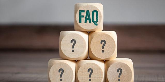 blocks with question marks and the letters FAQ 