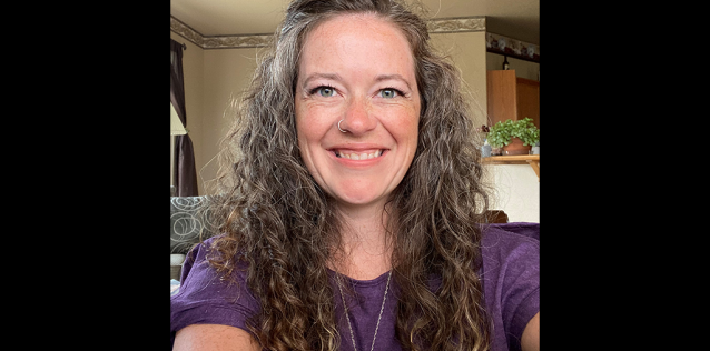 A picture of a woman with curly hair