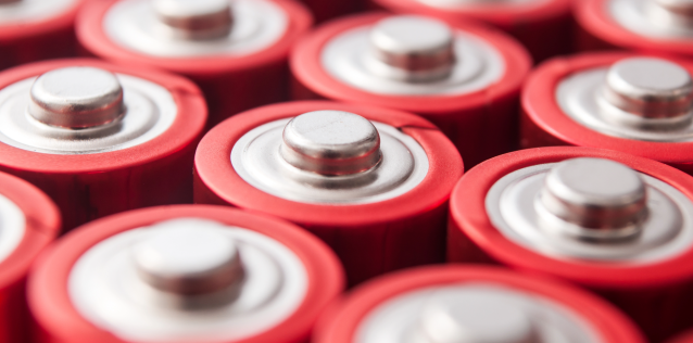 Red and silver batteries in rows.