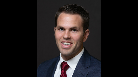 Man in a suit in a red tie
