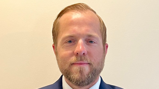 Man with blonde hair in a suit