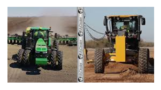 Two tractors, one green and one yellow